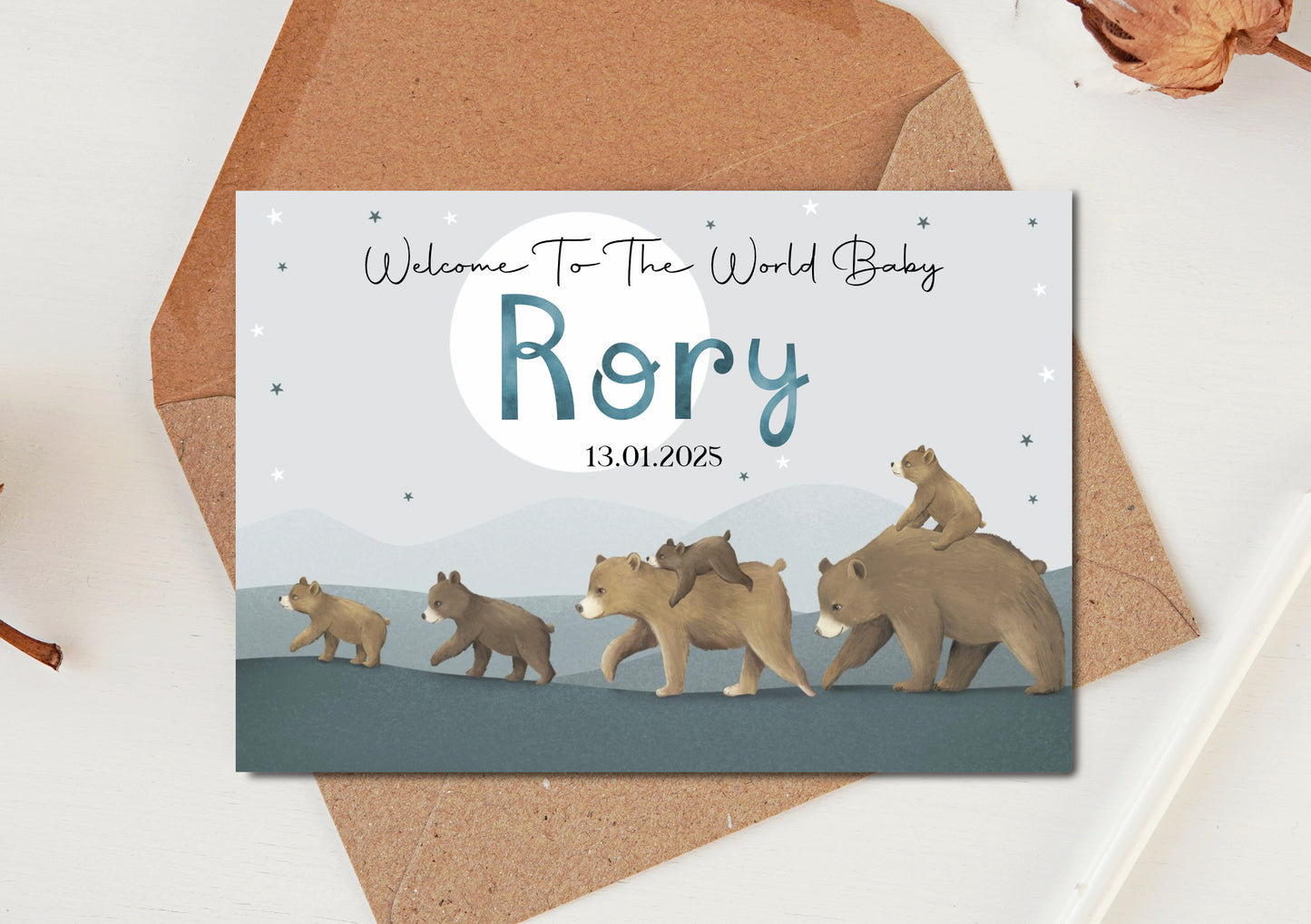Baby boy arrival card with bear family